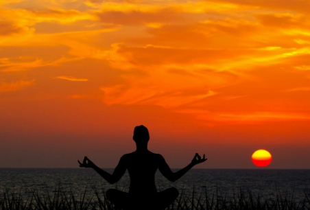 "Poker player meditating before a game, focusing on breathing and mental clarity."